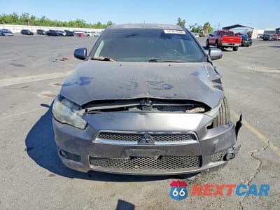 Piąte zdjęcie samochodu w środku: 2011 MITSUBISHI LANCER ES VIN:JA32U2FU4BU016621 - miniatura