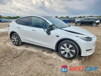 Czwarte zdjęcie samochodu z boku: 2023 TESLA MODEL Y VIN:7SAYGDEE2PF778955 - miniatura