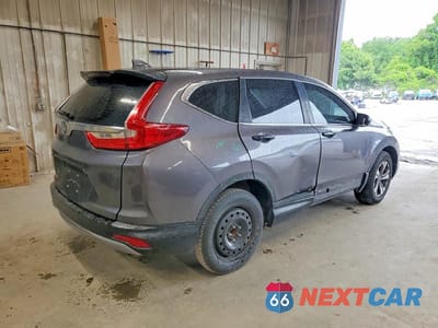 Trzecie zdjęcie samochodu z tyłu: 2018 HONDA CR-V LX VIN:2HKRW5H39JH400984 - miniatura
