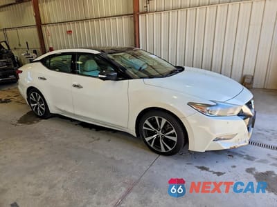 Czwarte zdjęcie samochodu z boku: 2016 NISSAN MAXIMA PLATINUM VIN:1N4AA6AP6GC411398 - miniatura