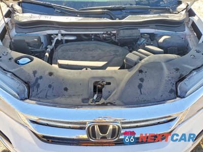Zdjęcie 11 z 12 samochodu: 2021 HONDA PILOT TOURING VIN:5FNYF6H92MB002038 - miniatura