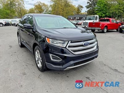 Czwarte zdjęcie samochodu z boku: 2018 FORD EDGE TITANIUM VIN:2FMPK3K99JBB41327 - miniatura