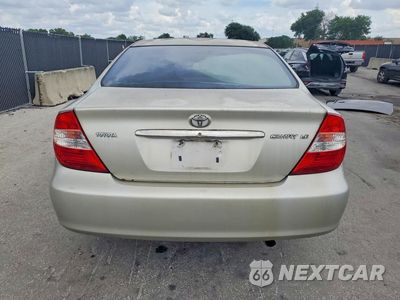 Zdjęcie 6 z 12 samochodu: 2004 TOYOTA CAMRY LE VIN:4T1BE32K64U856570 - miniatura