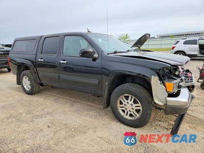 Czwarte zdjęcie samochodu z boku: 2012 GMC CANYON SLE-2 VIN:1GTH6PFEXC8116549 - miniatura