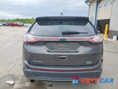 Zdjęcie 6 z 13 samochodu: 2018 FORD EDGE SEL VIN:2FMPK3J96JBC21024 - miniatura