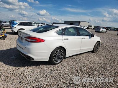 Trzecie zdjęcie samochodu z tyłu: 2017 FORD FUSION TITANIUM VIN:3FA6P0K97HR116184 - miniatura