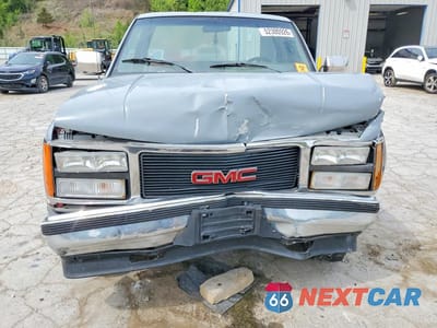 Piąte zdjęcie samochodu w środku: 1990 GMC SIERRA K1500 VIN:1GTDK14K6LE548086 - miniatura