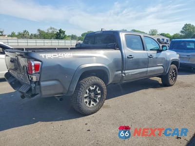Trzecie zdjęcie samochodu z tyłu: 2020 TOYOTA TACOMA TRD OFF-ROAD VIN:3TMDZ5BN5LM087098 - miniatura