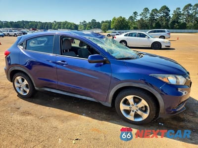 Czwarte zdjęcie samochodu z boku: 2016 HONDA HR-V LX VIN:3CZRU5H32GM716178 - miniatura