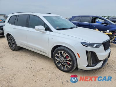 Czwarte zdjęcie samochodu z boku: 2023 CADILLAC XT6 SPORT VIN:1GYKPGRS7PZ109184 - miniatura