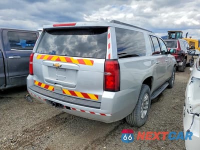 Trzecie zdjęcie samochodu z tyłu: 2019 CHEVROLET SUBURBAN K1500 LT VIN:1GNSKHKC8KR392756 - miniatura
