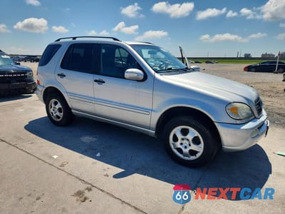 Czwarte zdjęcie samochodu z boku: 2003 MERCEDES-BENZ ML 350 VIN:4JGAB57EX3A439794 - miniatura