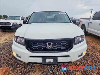 Piąte zdjęcie samochodu w środku: 2014 HONDA RIDGELINE SPORT VIN:5FPYK1F70EB004587 - miniatura