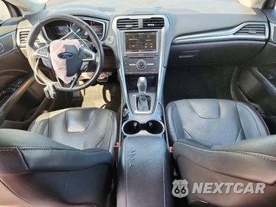 Zdjęcie 8 z 13 samochodu: 2016 FORD FUSION TITANIUM PHEV VIN:3FA6P0SU1GR229566 - miniatura