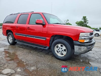 Czwarte zdjęcie samochodu z boku: 2001 CHEVROLET SUBURBAN K1500 VIN:3GNFK16T11G163434 - miniatura