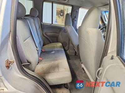 Zdjęcie 10 z 12 samochodu: 2007 JEEP LIBERTY SPORT VIN:1J4GL48K77W510432 - miniatura