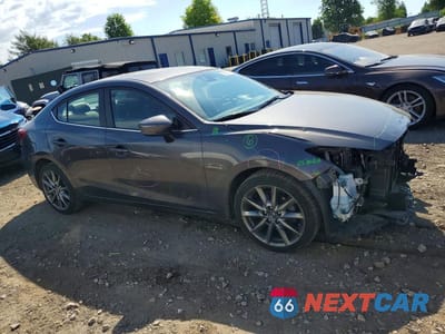 Czwarte zdjęcie samochodu z boku: 2018 MAZDA 3 GRAND TOURING VIN:3MZBN1W30JM164247 - miniatura