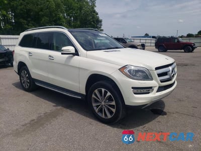 Czwarte zdjęcie samochodu z boku: 2013 MERCEDES-BENZ GL 450 4MATIC VIN:4JGDF7CEXDA211721 - miniatura
