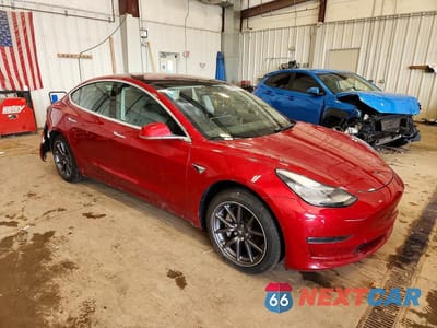 Czwarte zdjęcie samochodu z boku: 2018 TESLA MODEL 3 VIN:5YJ3E1EA6JF004630 - miniatura