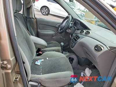 Zdjęcie 7 z 12 samochodu: 2003 FORD FOCUS LX VIN:1FAFP33Z63W329438 - miniatura
