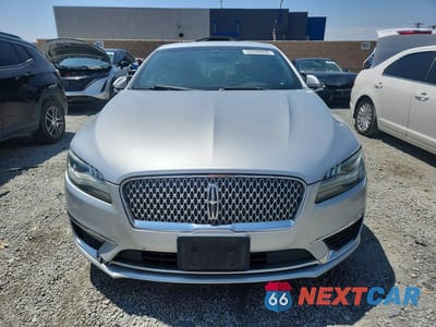 Piąte zdjęcie samochodu w środku: 2017 LINCOLN MKZ RESERVE VIN:3LN6L5FC5HR613982 - miniatura