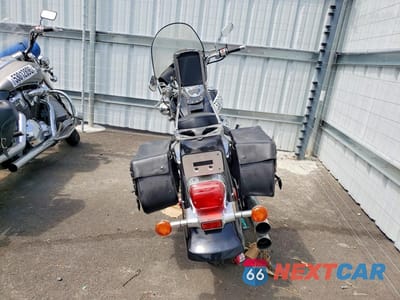 Czwarte zdjęcie samochodu z boku: 2002 SUZUKI VL800 VIN:JS1VS54A522107370 - miniatura