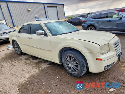 Czwarte zdjęcie samochodu z boku: 2010 CHRYSLER 300 TOURING VIN:2C3CA5CVXAH319325 - miniatura