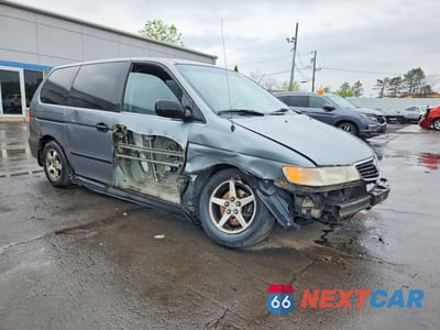 Czwarte zdjęcie samochodu z boku: 2000 HONDA ODYSSEY LX VIN:2HKRL1859YH604732 - miniatura