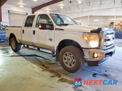 Czwarte zdjęcie samochodu z boku: 2014 FORD F350 SUPER DUTY VIN:1FT8W3BT8EEB78534 - miniatura
