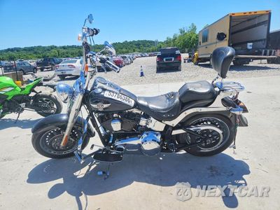 Trzecie zdjęcie samochodu z tyłu: 2011 HARLEY-DAVIDSON FLSTF VIN:1HD1BX510BB021381 - miniatura