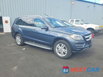 Czwarte zdjęcie samochodu z boku: 2014 MERCEDES-BENZ GL 450 4MATIC VIN:4JGDF7CE2EA283966 - miniatura