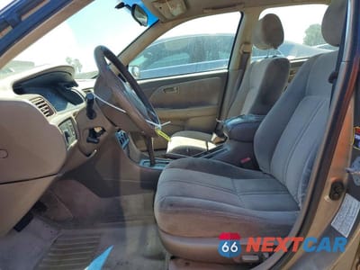 Zdjęcie 7 z 12 samochodu: 1999 TOYOTA CAMRY LE VIN:4T1BG22K9XU864364 - miniatura
