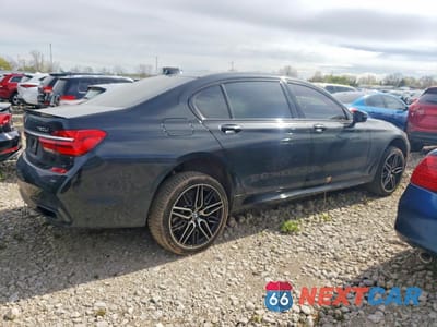 Trzecie zdjęcie samochodu z tyłu: 2018 BMW 750 XI VIN:WBA7F2C55JB238736 - miniatura