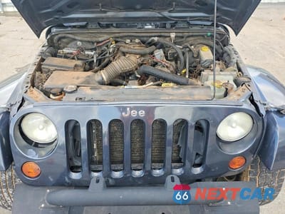 Zdjęcie 12 z 14 samochodu: 2008 JEEP WRANGLER UNLIMITED SAHARA VIN:1J4GA59138L604358 - miniatura