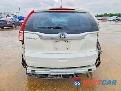 Zdjęcie 6 z 14 samochodu: 2015 HONDA CR-V LX VIN:5J6RM3H3XFL015151 - miniatura