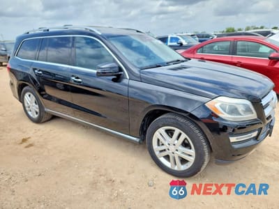 Czwarte zdjęcie samochodu z boku: 2016 MERCEDES-BENZ GL 450 4MATIC VIN:4JGDF6EE1GA620427 - miniatura