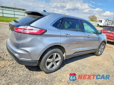 Trzecie zdjęcie samochodu z tyłu: 2021 FORD EDGE SEL VIN:2FMPK4J90MBA60132 - miniatura