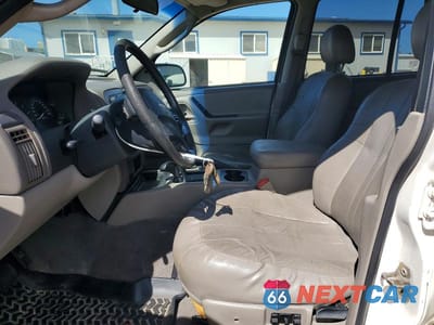 Zdjęcie 7 z 13 samochodu: 2004 JEEP GRAND CHEROKEE LAREDO VIN:1J4GW48N84C378439 - miniatura