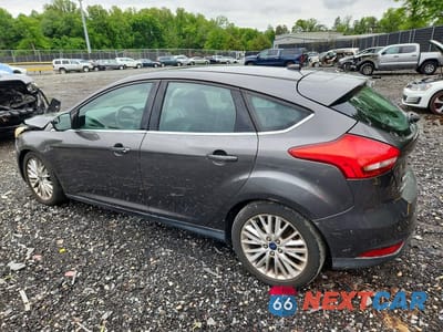 Drugie zdjęcie samochodu z przodu: 2015 FORD FOCUS TITANIUM VIN:1FADP3N21FL247274 - miniatura