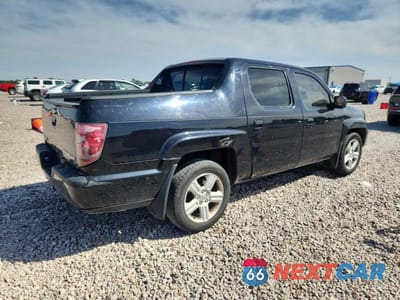 Trzecie zdjęcie samochodu z tyłu: 2009 HONDA RIDGELINE RTL VIN:5FPYK165X9B105527 - miniatura
