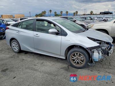 Czwarte zdjęcie samochodu z boku: 2022 TOYOTA PRIUS L ECO VIN:JTDKAMFU5N3160842 - miniatura