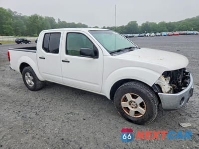Czwarte zdjęcie samochodu z boku: 2006 NISSAN FRONTIER SE VIN:1N6AD07U06C474522 - miniatura