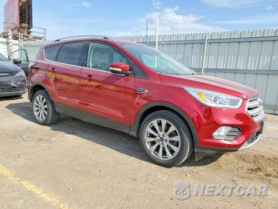 Czwarte zdjęcie samochodu z boku: 2018 FORD ESCAPE TITANIUM VIN:1FMCU0J91JUA37207 - miniatura