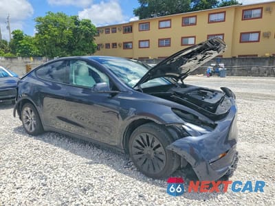 Czwarte zdjęcie samochodu z boku: 2024 TESLA MODEL Y VIN:7SAYGDED1RF034256 - miniatura