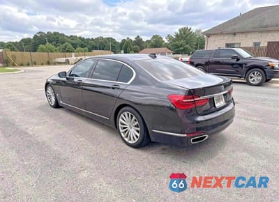 Trzecie zdjęcie samochodu z tyłu: 2016 BMW 740 I VIN:WBA7E2C52GG503997 - miniatura