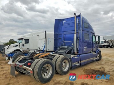 Czwarte zdjęcie samochodu z boku: 2022 VOLVO VN VNL VIN:4V4NC9EH0NN288777 - miniatura