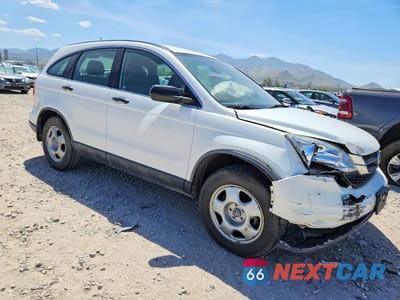 Czwarte zdjęcie samochodu z boku: 2010 HONDA CR-V LX VIN:JHLRE4H34AC013769 - miniatura