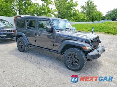 Czwarte zdjęcie samochodu z boku: 2021 JEEP WRANGLER UNLIMITED SPORT VIN:1C4HJXDN5MW817014 - miniatura