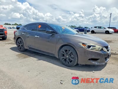 Czwarte zdjęcie samochodu z boku: 2016 NISSAN MAXIMA 3.5 S VIN:1N4AA6AP6GC441646 - miniatura