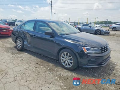 Czwarte zdjęcie samochodu z boku: 2015 VOLKSWAGEN JETTA SE VIN:3VWD07AJ9FM353681 - miniatura